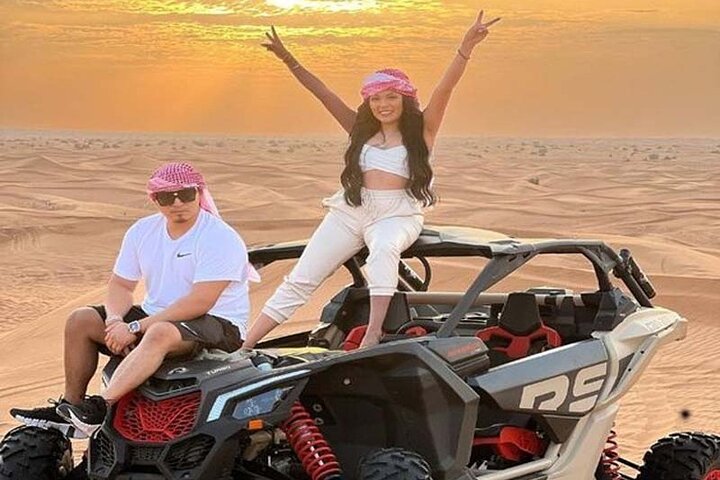 Polaris buggy sunset couple