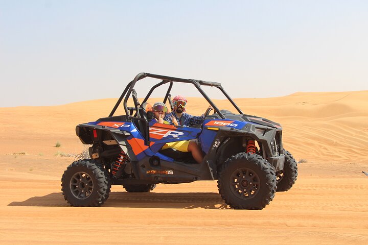 Red sand dune buggy family